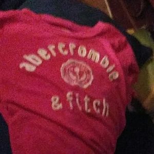 A short sleeve pink and white T-Shirt